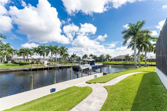 exterior space featuring a water view and a yard