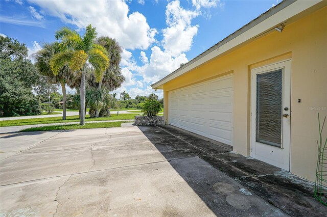 garage with a yard