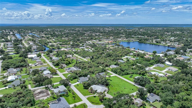 drone / aerial view featuring a water view