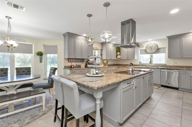 kitchen with island exhaust hood, a center island, gray cabinets, and stainless steel dishwasher