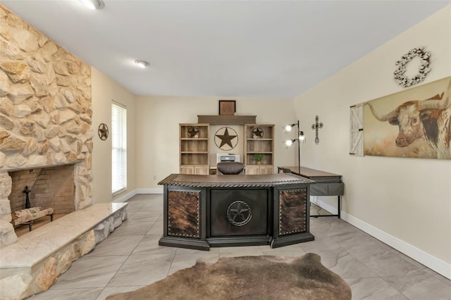 interior space with a fireplace and a kitchen island