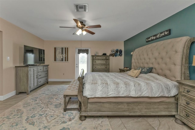 bedroom featuring ceiling fan