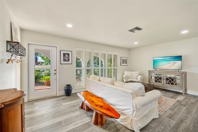 bedroom featuring access to outside and hardwood / wood-style floors