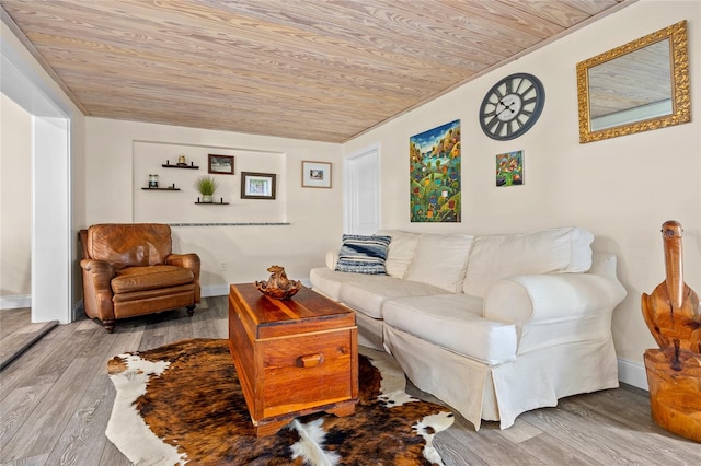 living room with wood ceiling and light hardwood / wood-style floors