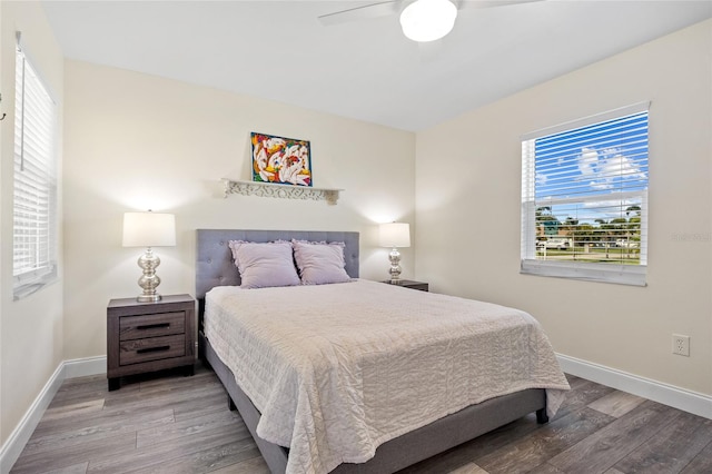 bedroom featuring ceiling fan and light hardwood / wood-style floors