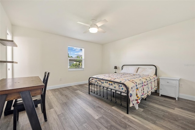 bedroom featuring ceiling fan and light wood-type flooring