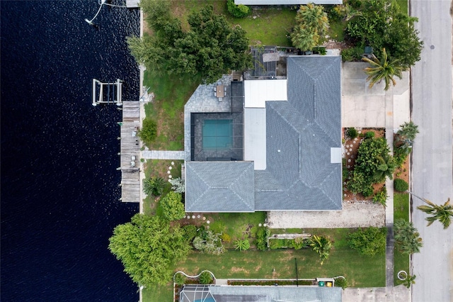 bird's eye view with a water view