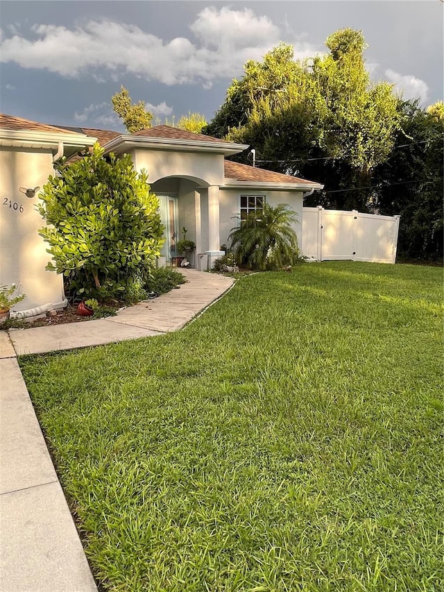 exterior space with a front lawn