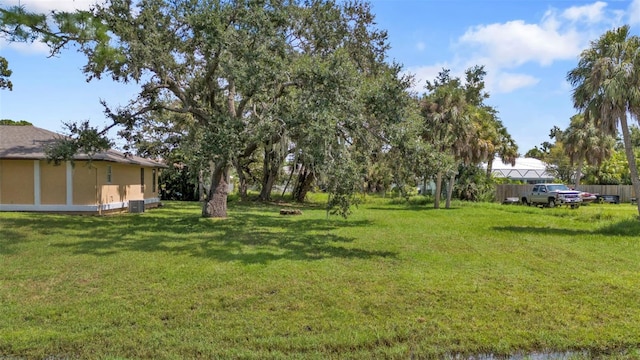 view of yard with central AC