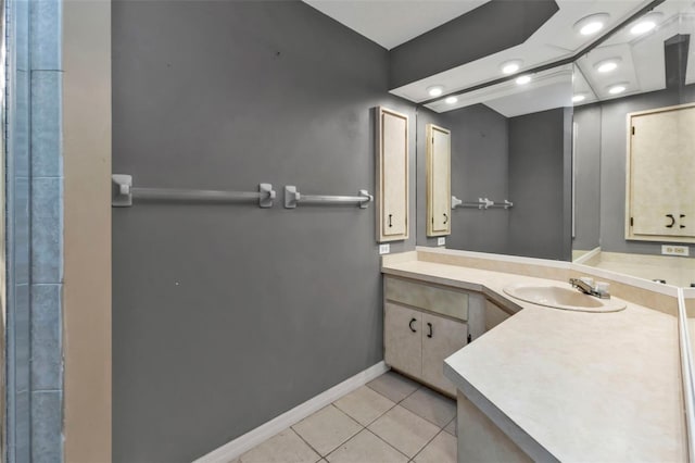 bathroom with vanity and tile patterned floors