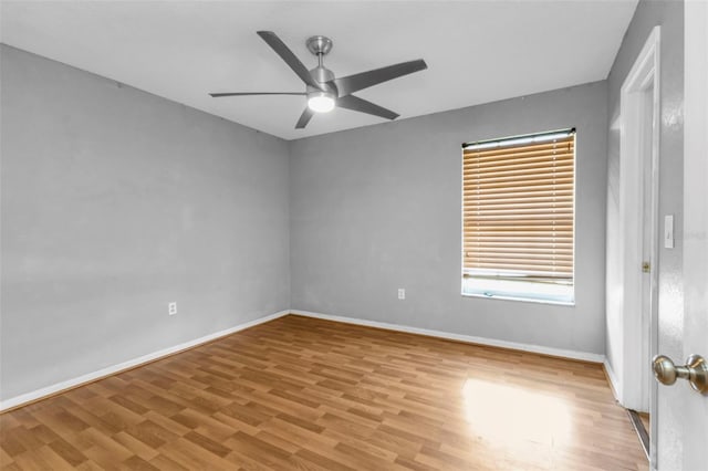 unfurnished room with light hardwood / wood-style floors and ceiling fan