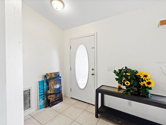 view of tiled foyer entrance