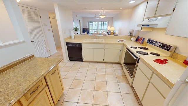 kitchen featuring hanging light fixtures, light tile patterned floors, dishwasher, sink, and white electric range oven