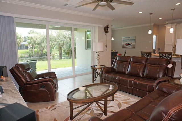 living room with crown molding, a healthy amount of sunlight, light tile patterned flooring, and ceiling fan