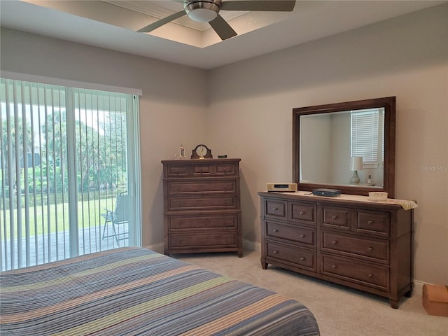 bedroom with ceiling fan, light colored carpet, and access to outside