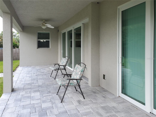 view of patio with ceiling fan