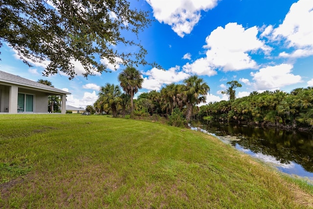 view of yard with a water view