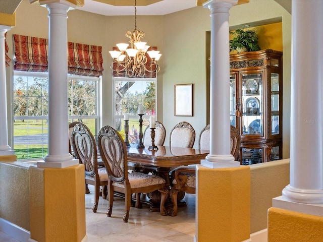 dining space with a chandelier