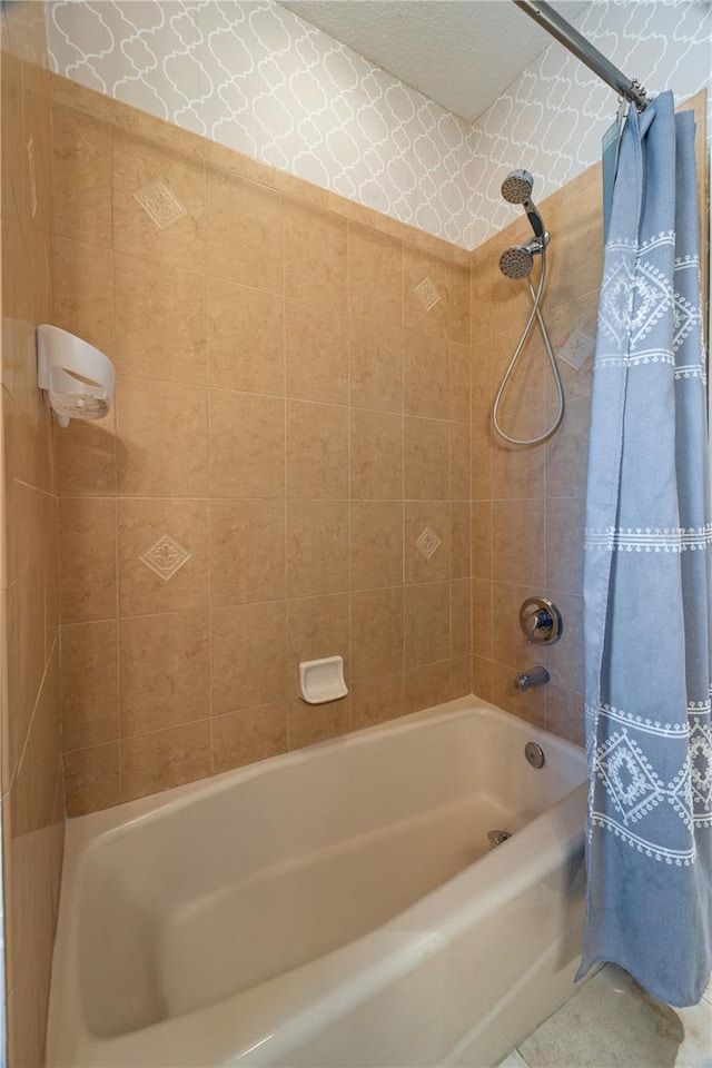 bathroom featuring shower / tub combo with curtain