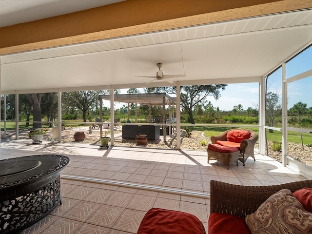 view of patio featuring ceiling fan