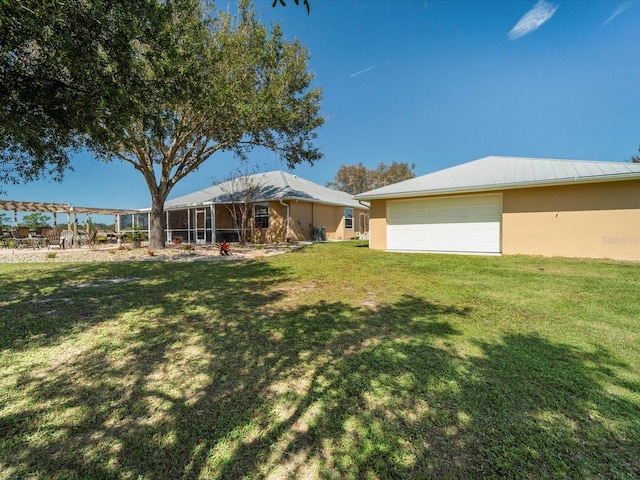 view of yard with a garage