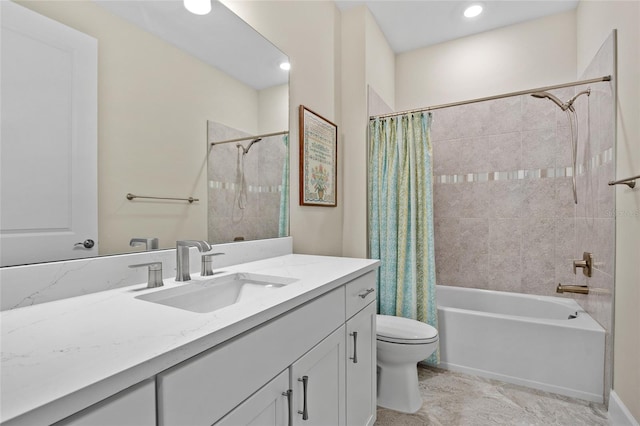 full bathroom featuring vanity, toilet, and shower / bath combination with curtain