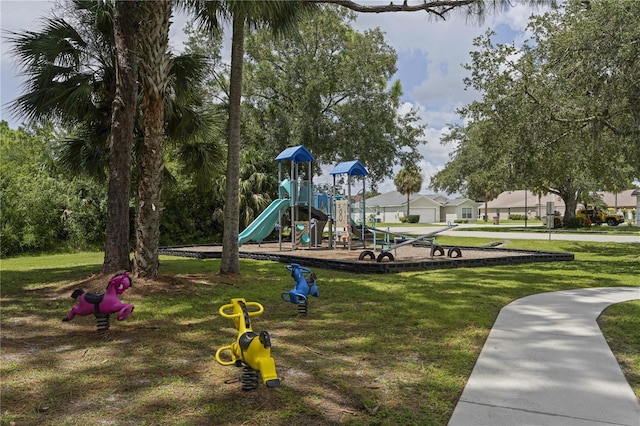 community play area with a lawn