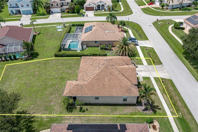 birds eye view of property with a residential view