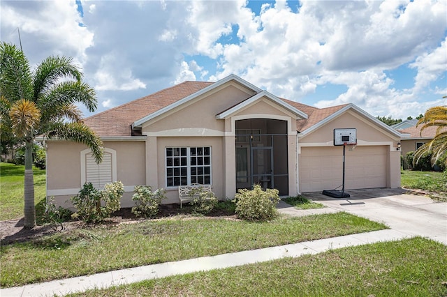 ranch-style home with a front lawn, concrete driveway, an attached garage, and stucco siding