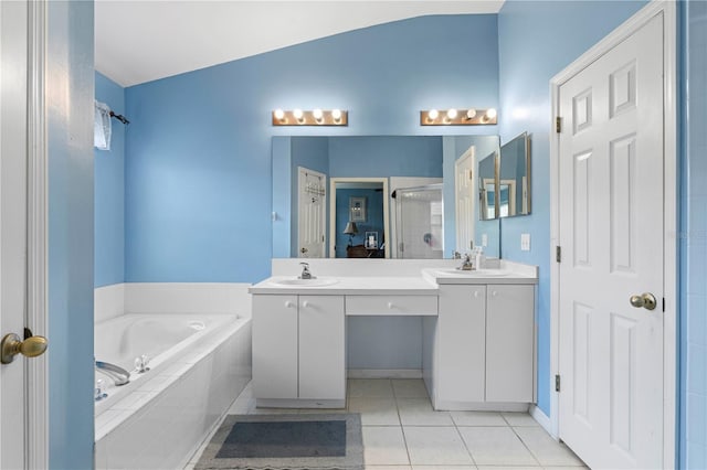 bathroom featuring vanity, vaulted ceiling, tile patterned floors, and plus walk in shower