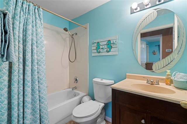 bathroom featuring shower / tub combo, vanity, and toilet