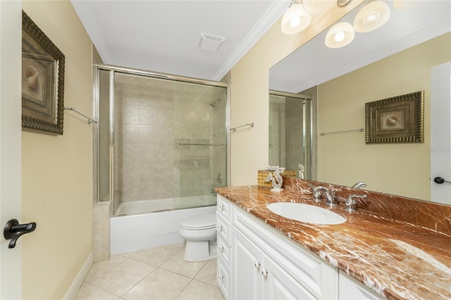 full bathroom with toilet, tile patterned floors, crown molding, vanity, and enclosed tub / shower combo