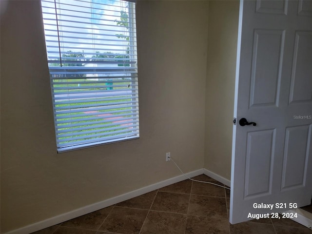 view of tiled spare room