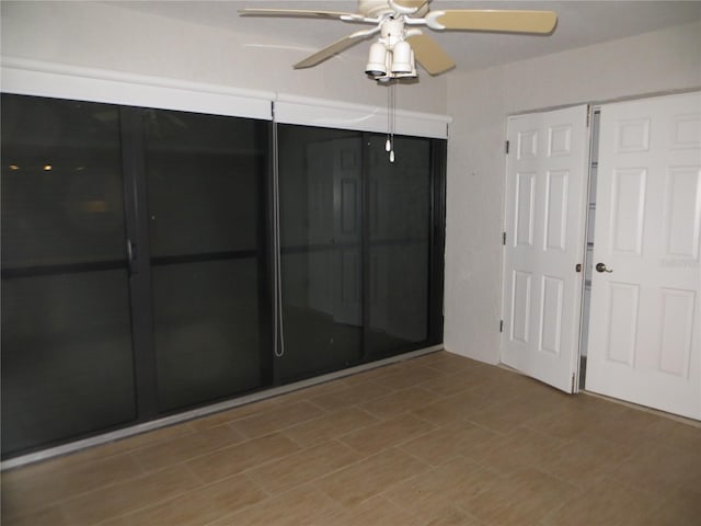 empty room featuring ceiling fan