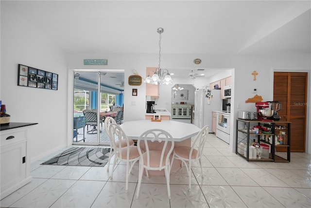 dining space featuring an inviting chandelier