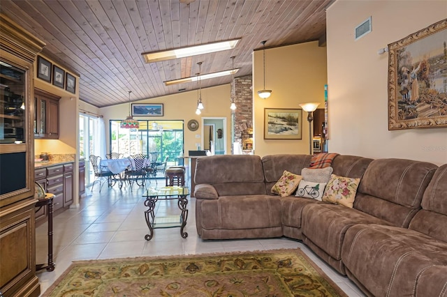 living room featuring wood ceiling, light tile patterned floors, high vaulted ceiling, and a skylight