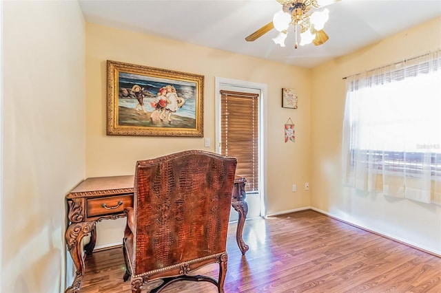 office area with ceiling fan and hardwood / wood-style flooring