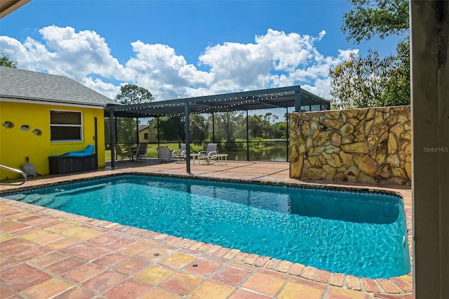 view of swimming pool with a water view, a lanai, and a patio