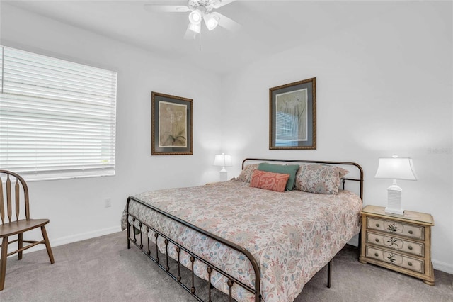 bedroom with carpet floors, ceiling fan, and baseboards