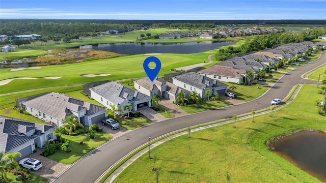 aerial view featuring a residential view, a water view, and golf course view