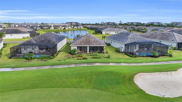 bird's eye view with a water view and a residential view