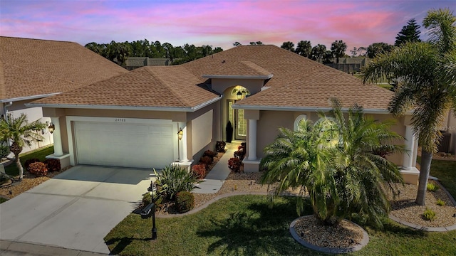 view of front of home featuring a garage