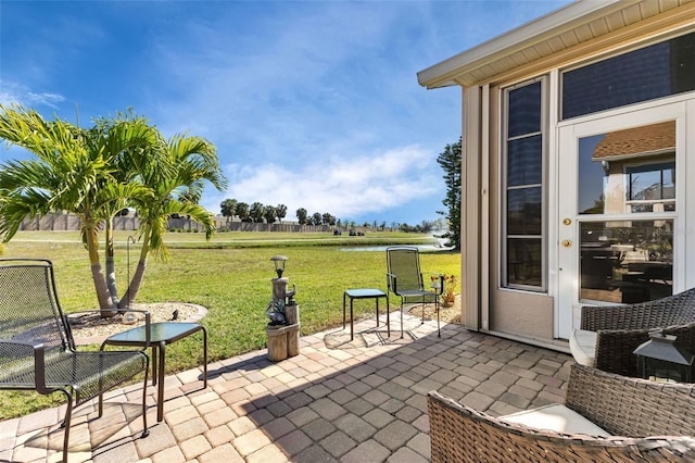 24588 Buckingham Way, Port Charlotte, FL 33980 - view of patio / terrace with a water view