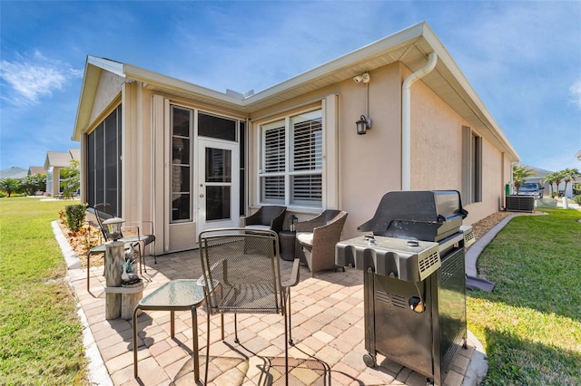 exterior space with a yard and a patio area