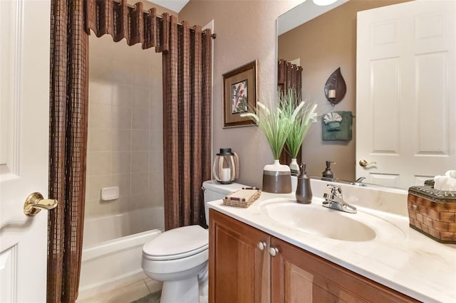 full bathroom with vanity, toilet, tile patterned floors, and shower / bath combo with shower curtain