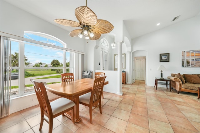 dining space featuring a healthy amount of sunlight, light tile patterned floors, and ceiling fan