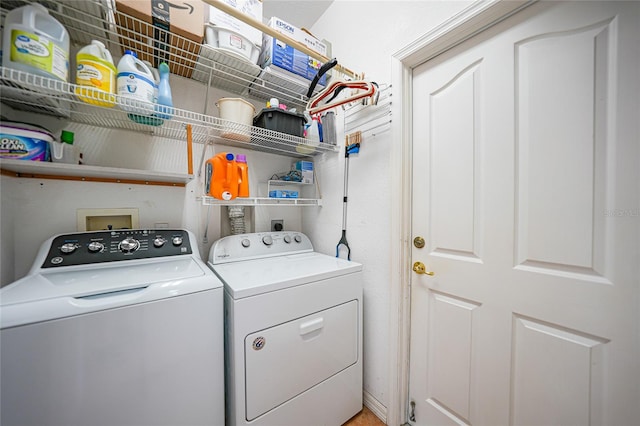 laundry room featuring independent washer and dryer