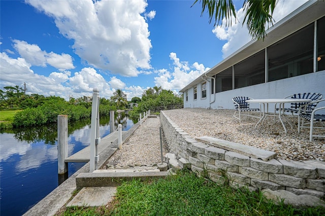 dock area featuring a water view