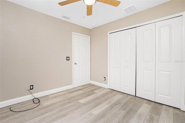 3159 Draper Ter, North Port, FL 34286 - unfurnished bedroom with light wood-style flooring, baseboards, a closet, and ceiling fan