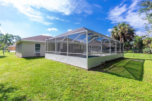 3159 Draper Ter, North Port, FL 34286 - rear view of property with stucco siding and a lanai